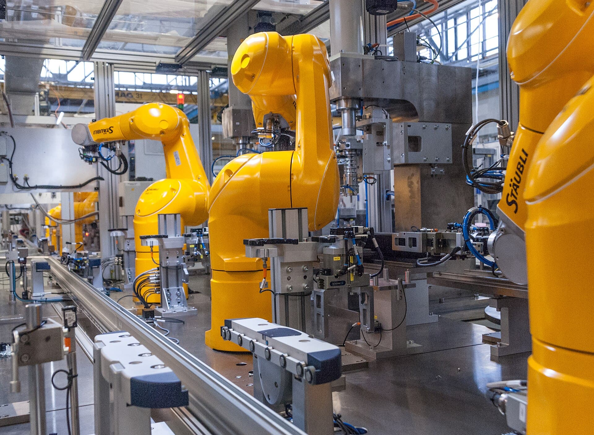 Industrial robots operating on a manufacturing line