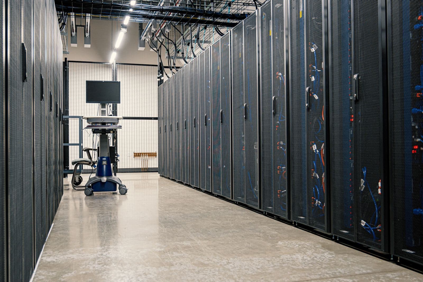 Server racks and network infrastructure inside a real data center